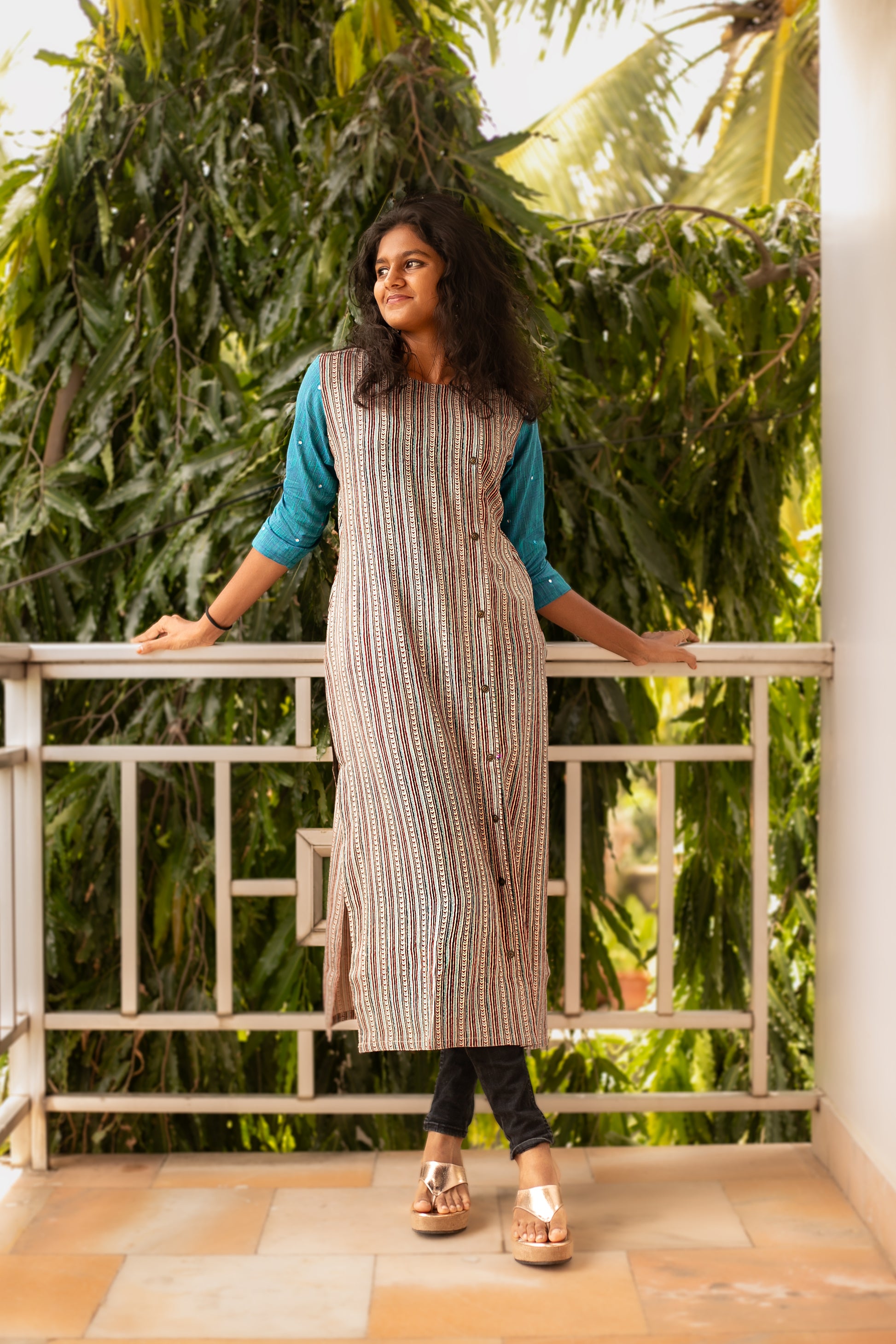 A Rayon A-Line designer kurti with contrast sleeves and mirror work. Handcrafted in Chennai