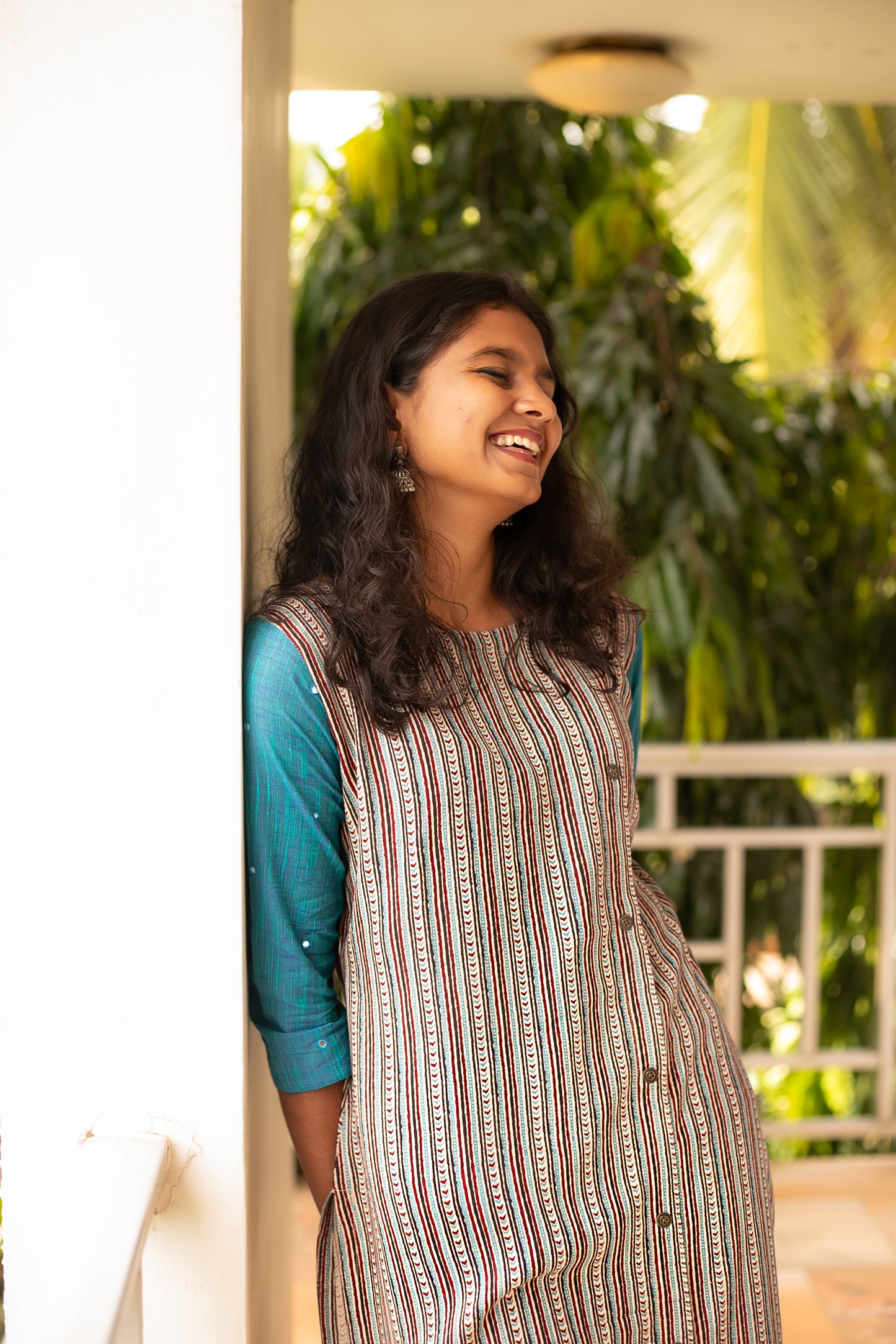 A Rayon A-Line designer kurti with contrast sleeves and mirror work. Handcrafted in Chennai