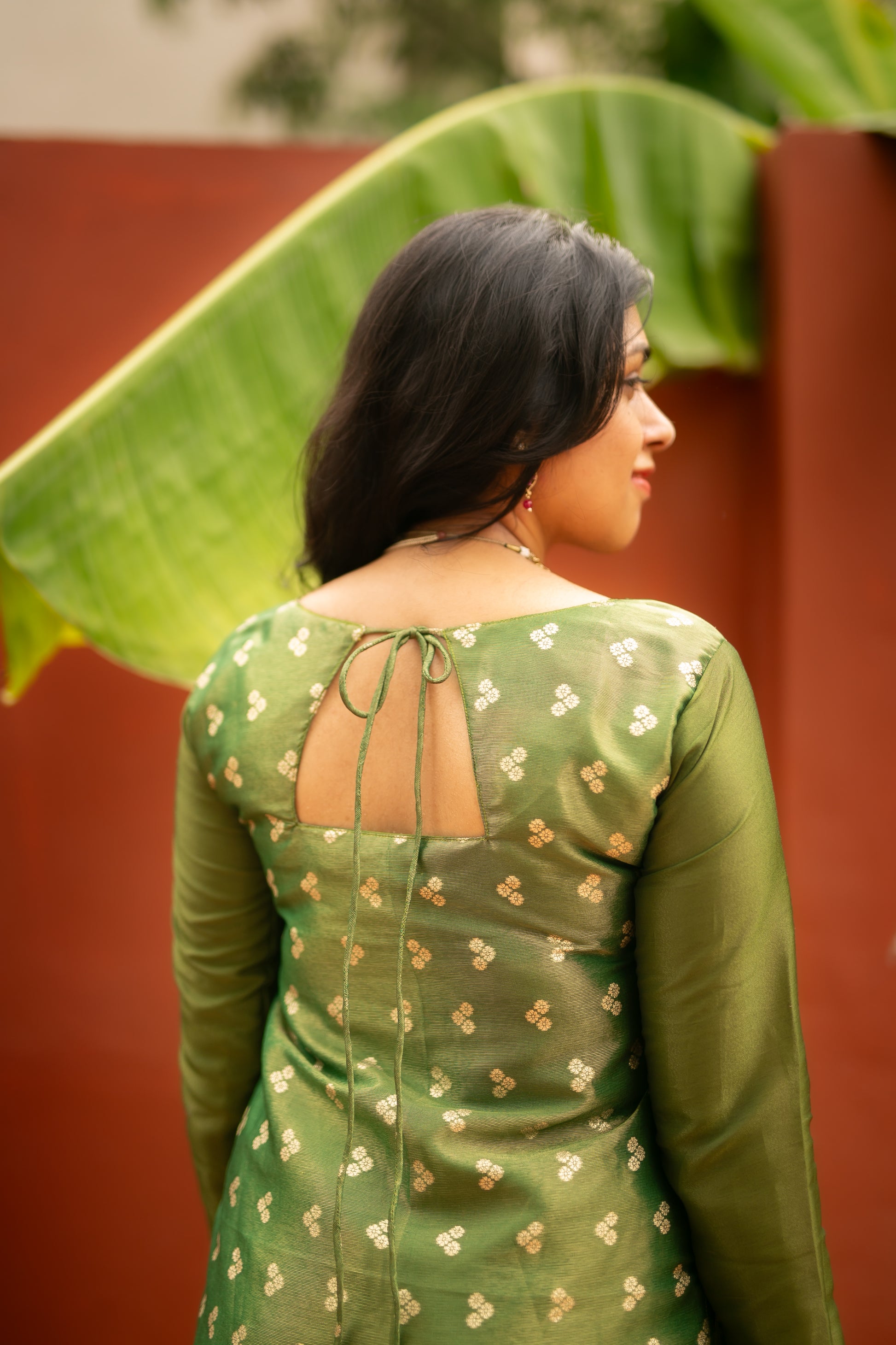 Green Tissue Designer Kurti with Gold Dots