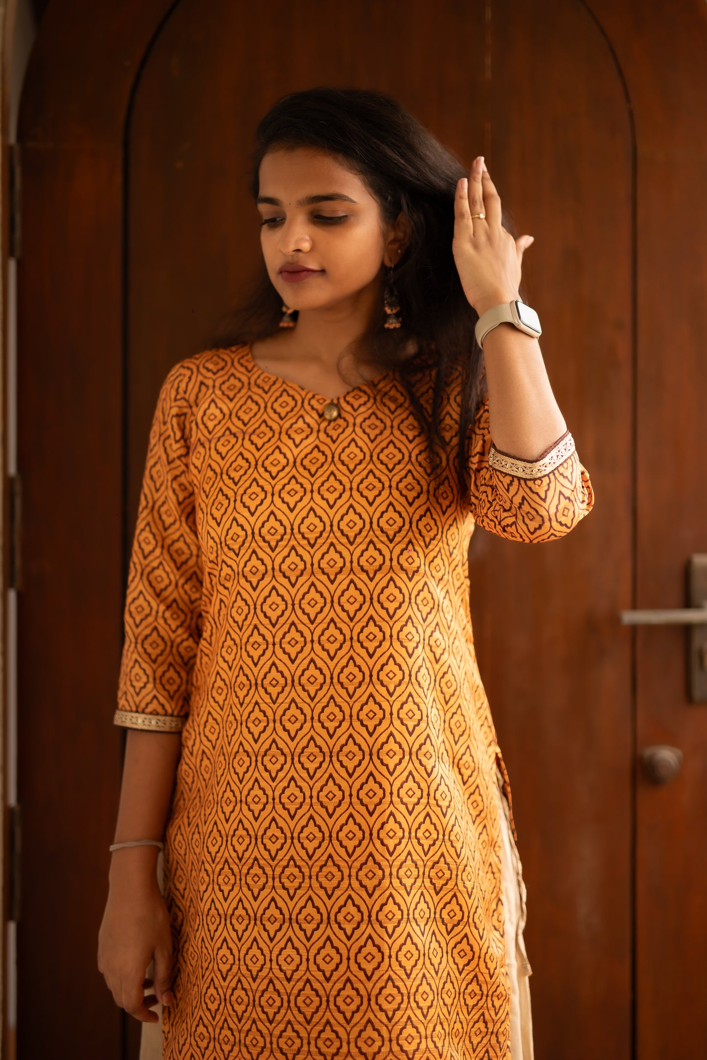 A Classic Sakyaa design featuring semi tussar fabric, lined with a warm and elegant gold lace and 3/4th sleeves.