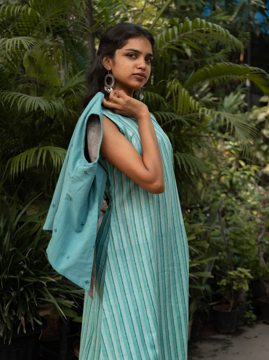 Styled layered look of blue striped cotton ankle-length kurti with blue handloom sleeveless waistcoat from Sakyaa's ethnic collection