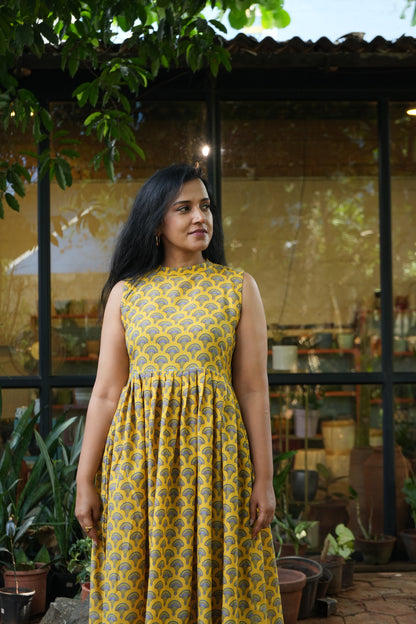 Yellow pleated dress